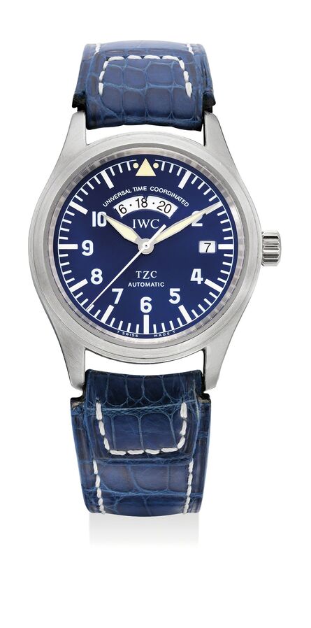 IWC, ‘A very fine, rare and attractive platinum dual time wristwatch with center seconds, date, blue dial, guarantee and box, numbered 131 of a limited edition of 500 pieces’, Circa 1998