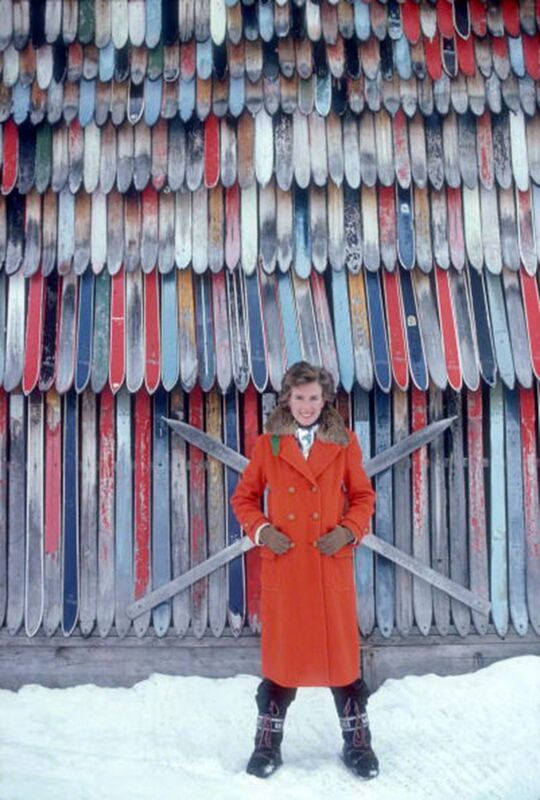 Slim Aarons, ‘Princess Ruspoli, 1979: Princess Lucy Ruspoli stands in front of a colorful wall of old skis in Lech am Arlberg, Austria’, 1979, Photography, C-Print, Staley-Wise Gallery