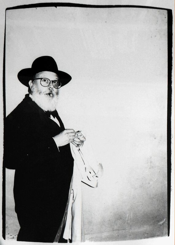 Andy Warhol, ‘Andy Warhol, Photograph of Henry Geldzahler Lighting a Cigar, 1981’, 1981, Photography, Silver Gelatin Print, Hedges Projects