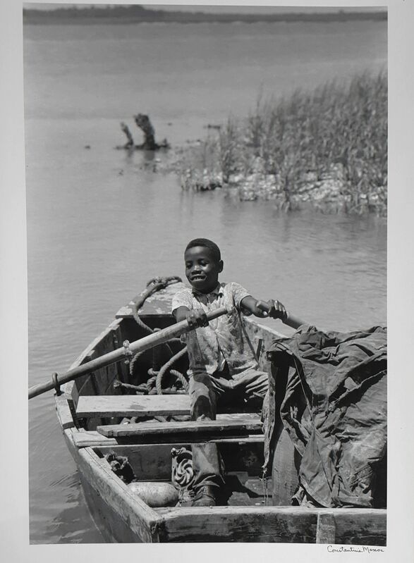 Constantine Manos, ‘Untitled, Island Boy, Daufuskie Island, South Carolina (vertical boy in rowboat)’, 1952, Photography, Archival digital pigment print, Robert Klein Gallery