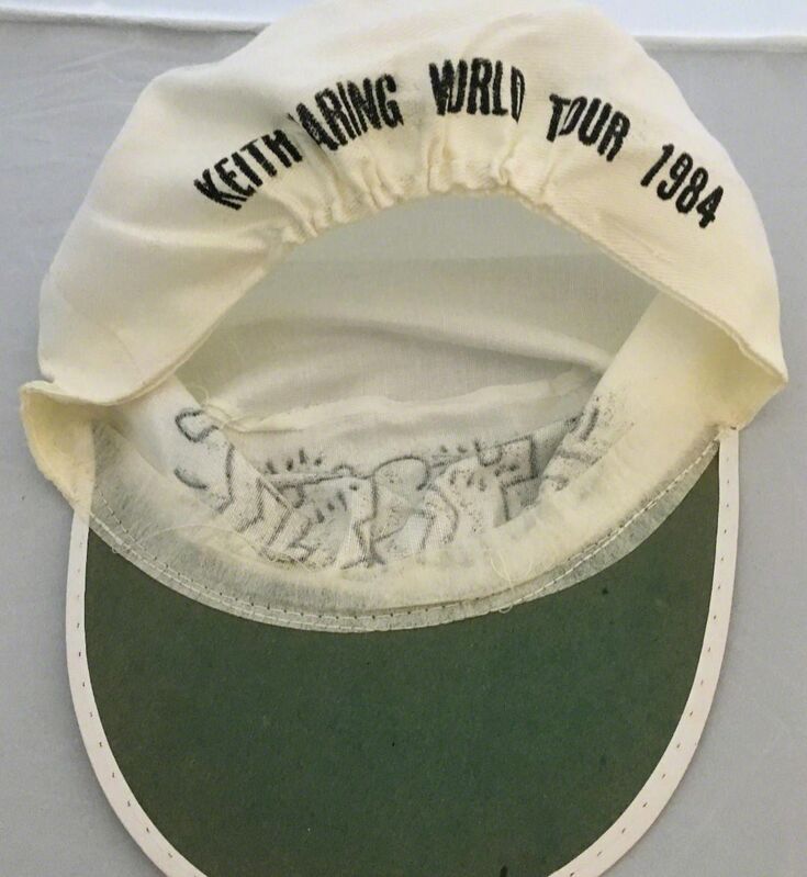 Keith Haring, ‘Keith Haring World Tour (hat)’, 1984, Ephemera or Merchandise, Embroidered stitching on white painter's style cap, Lot 180