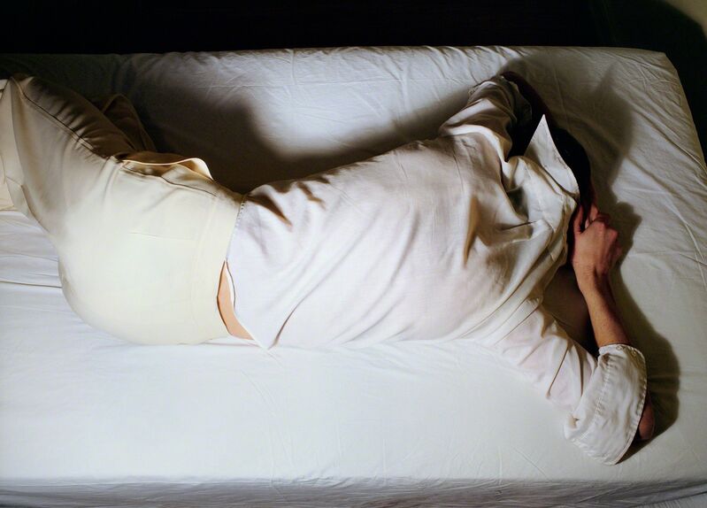 Jo Ann Callis, ‘Man in White on Bed’, 1979, Photography, Archival Pigment Print, ROSEGALLERY