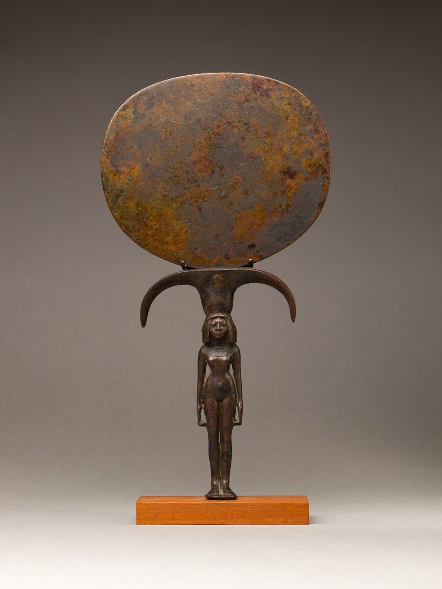Mirror with a Handle in the Shape of a Young                    Woman, ca. 1550–1391 B.C.E. Courtesy of the                    Metropolitan Museum of Art. 