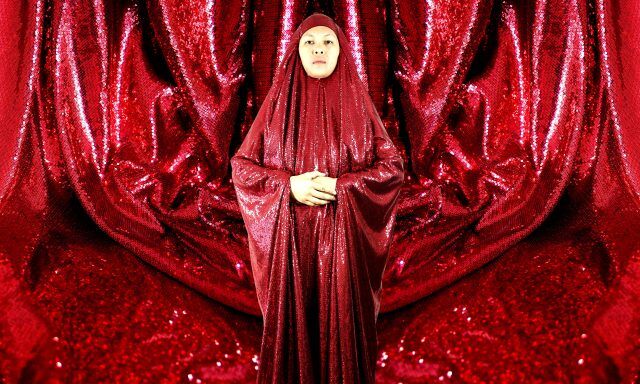 The Red Chador, A Performance Project by Anida Yoeu Ali. Photo courtesy of Pu Sem &amp; 4A Centre for Contemporary Asian Art