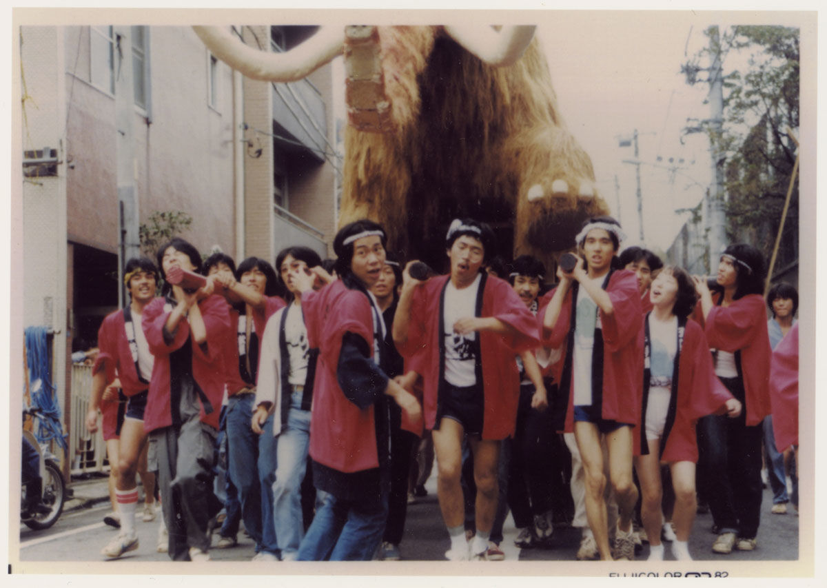 Mammoth sculpture by Murakami and classmates pictured during a parade in the early 1980s. ©︎ Takashi Murakami/Kaikai Kiki Co., Ltd. All Rights Reserved. Courtesy of Gagosian.