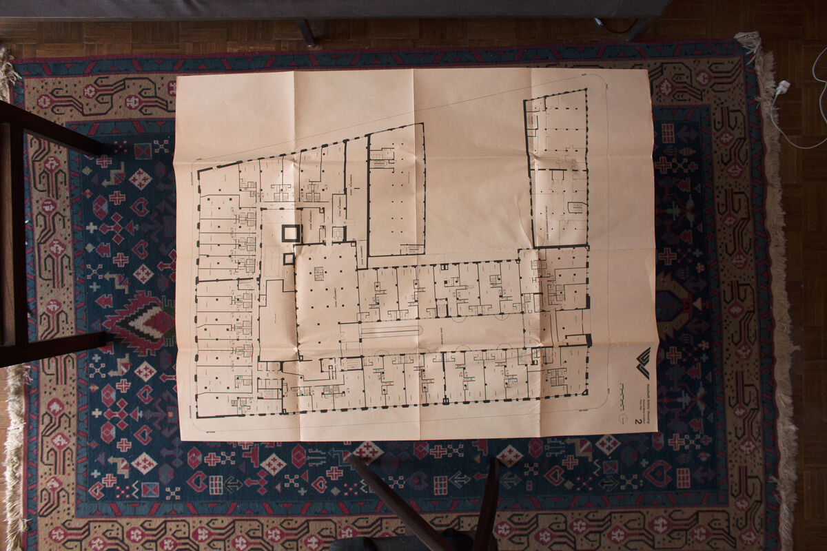 Architect Richard Meier’s blueprint of the second floor on the coffee table in Westbeth Artists Residents Council president Roger Braimon’s apartment in the complex. Photo by Frankie Alduino.