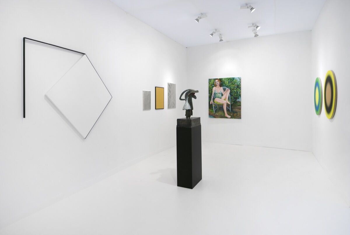 Installation view of Kamel Mennour&#x27;s booth at FIAC 2019, Paris. © The artists (from left to right): ADAGP François Morellet, Christodoulos Panayiotou, ADAGP Camille Henrot, ADAGP Martial Raysse, Ugo Rondinone Photo. Courtesy of the artists, Studio Morellet, and Kamel Mennour, Paris/London. 