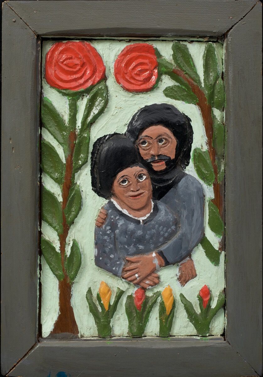 Elijah Pierce, Couple with Roses, 1975. Paint on carved wood. The Collection of Jill and Sheldon Bonovitz. Promised gift to the Philadelphia Museum of Art. Courtesy of the Barnes Foundation.
