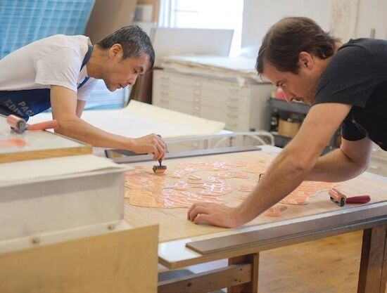 Printers Yasu Shibata and Justin Israels at the Pace Editions workshop in Manhattan. Image Courtesy of Pace Prints.