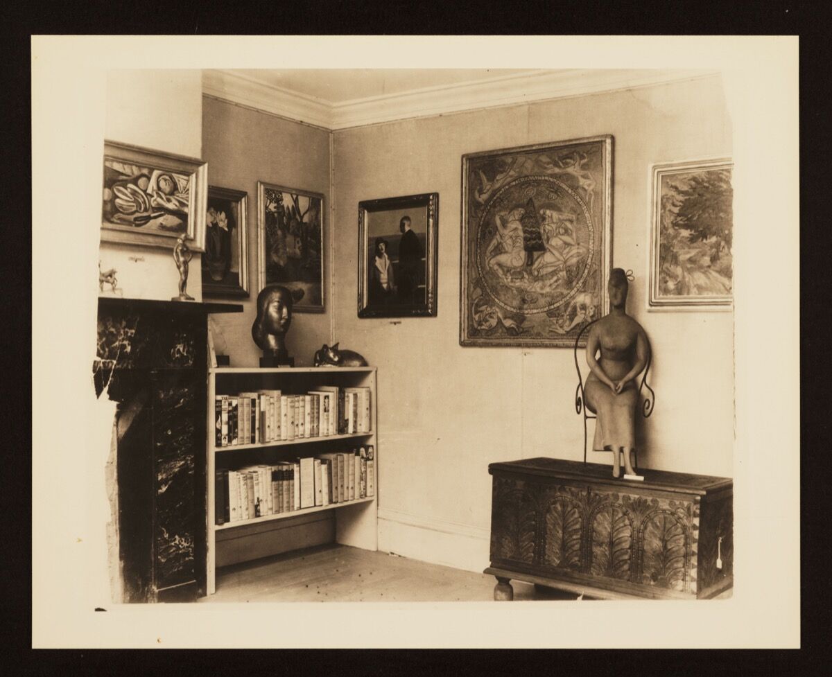 The inaugural exhibition at the Downtown Gallery in November 1926, featuring Marguerite Zorach&#x27;s tapestry Memories of a Summer in the White Mountains and Elie Nadelman&#x27;s sculpture Seated Woman. Courtesy of the Jewish Museum.     