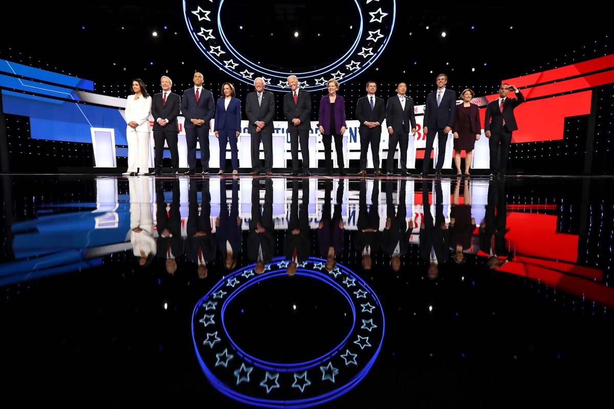 Democratic presidential candidates at the strart of the Democratic Presidential Debate at Otterbein University on October 15, 2019 in Westerville, Ohio. Photo by Chip Somodevilla/Getty Images.