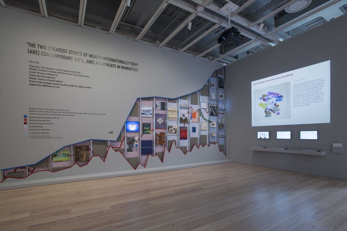 Installation view of Occupy Museums, “Debtfair,” 2017, in the 2017 Whitney Biennial. Photo by Bill Orcutt. Courtesy of the artists.