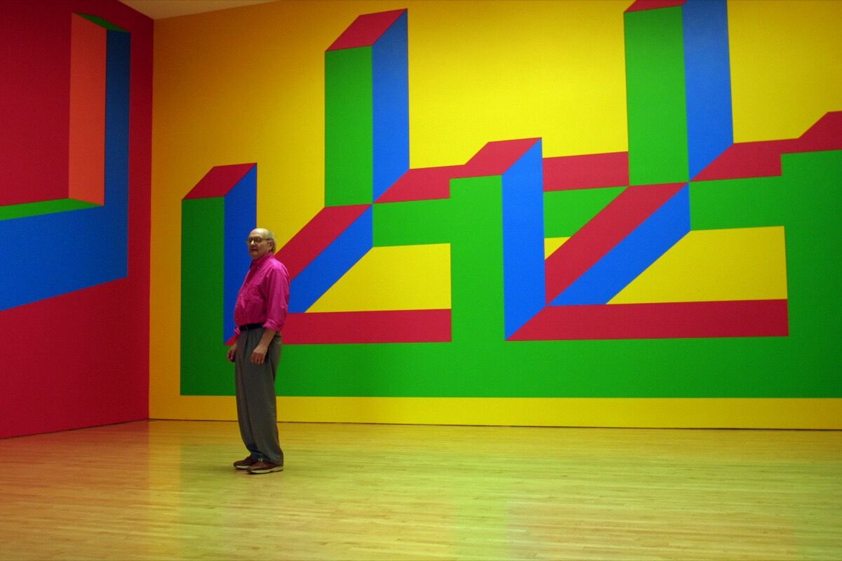 Sol LeWitt dwarfed by his Wall Drawing No. 993, at the Margo Leavin Gallery, Los Angeles. Photo by Gina Ferazzi/Los Angeles Times via Getty Images.
