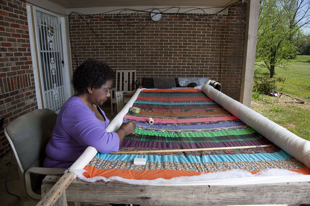 A resident of Gee's Bend sews a quilt, 2010. Photo by Carol M. Highsmith. Courtesy of  the Library of Congress.