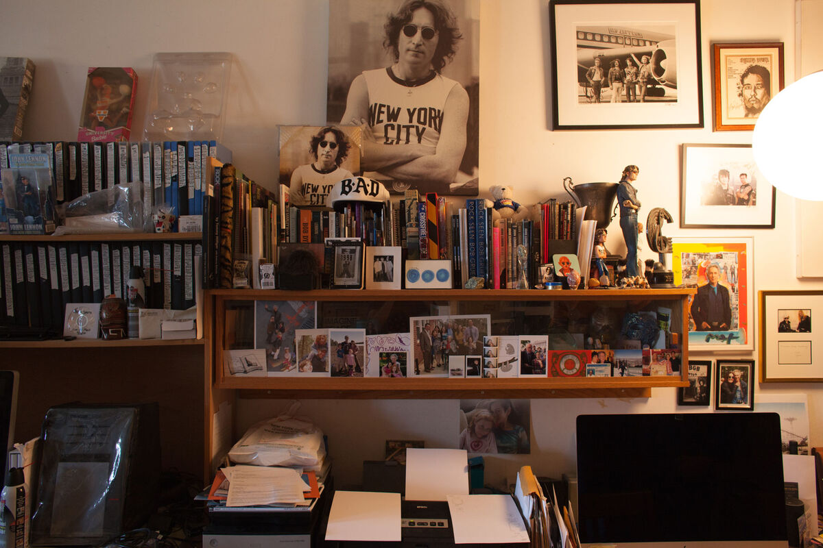 Rock photographer Bob Gruen’s famous 1974 portrait of John Lennon overlooks an apartment crammed with 50 years’ worth of negatives—an archive his wife, Elizabeth Gregory-Gruen, is painstakingly working to organize. Photo by Frankie Alduino.