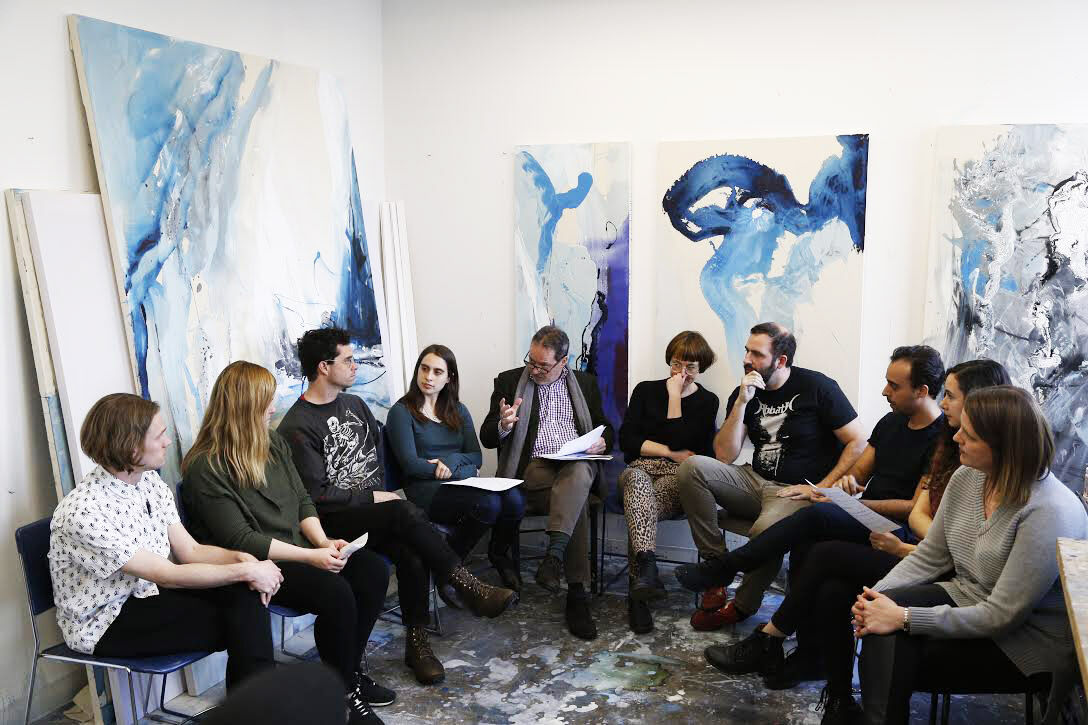 Joachim Pissarro, Bershad Professor of Art History and Director of the Hunter College Art Galleries, in conversation with students in the Spring 2022 Thesis exhibition. Photo by Carlos Rigau.