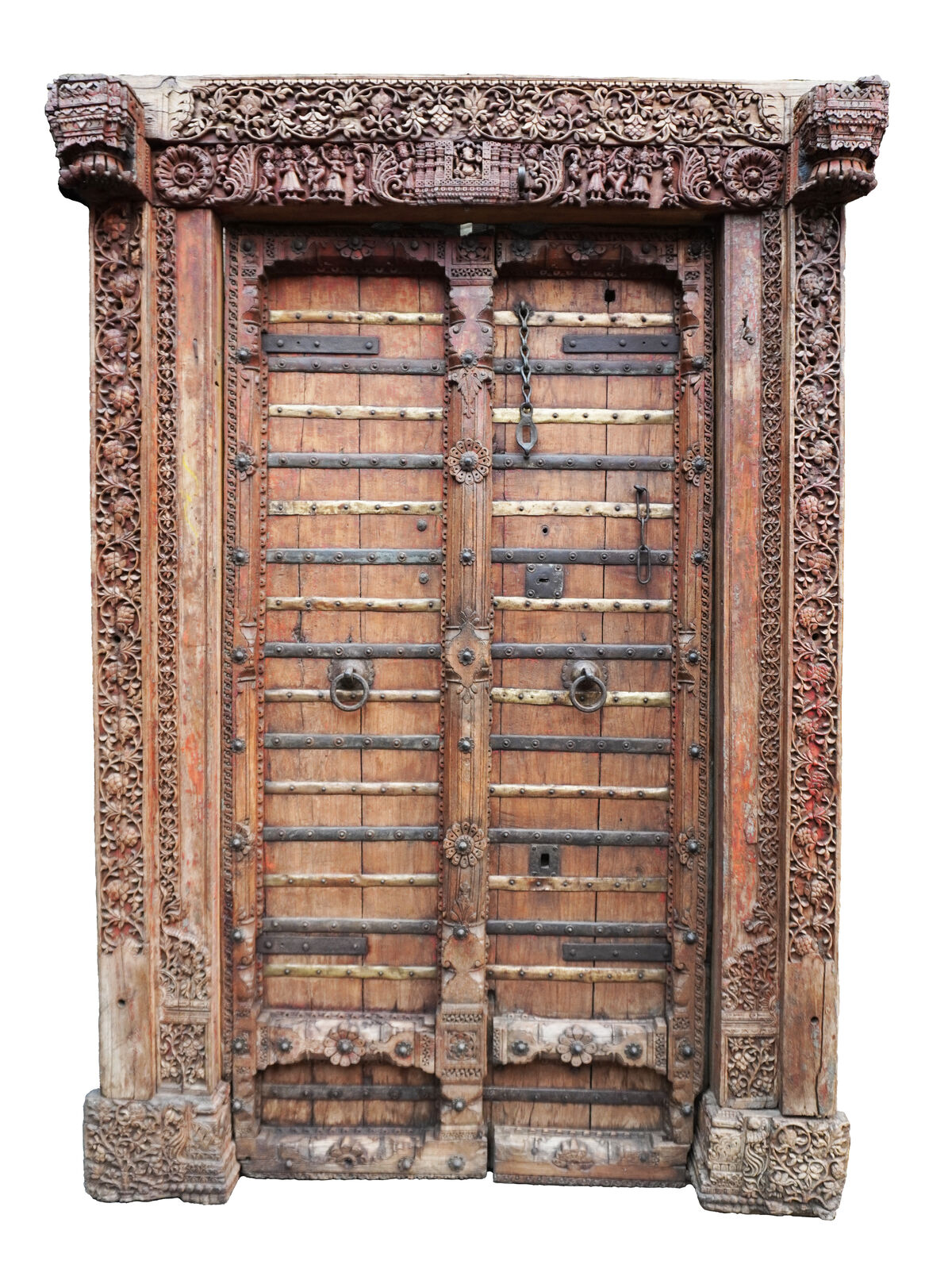 Door with scenes of Krishna guarded by Gopis, Hand-carved teak wood with metal applications, 18th Century, India, 222 x 150 x 20 cm. PHOTO CREDIT: Rodrigo Rivero Lake