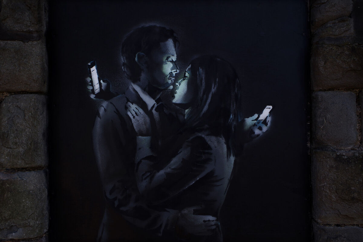 Banksy, Mobile Lovers, 2014. Photo by Duncan Hull, via Flickr.