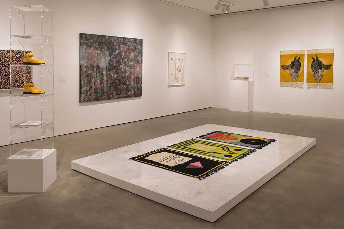 Baseera Khan, installation view, from left to right, of Purple Heart, Lunar Count Down, and Act Up in “Long, Winding Journeys: Contemporary Art and the Islamic Tradition” at the Katonah Museum of Art, Katonah, 2018. Handmade wool rugs custom designed by the artist, made in Kashmir, 48 × 30 in, installed on marble platform, 2018. Courtesy of the artist and Simone Subal Gallery. 