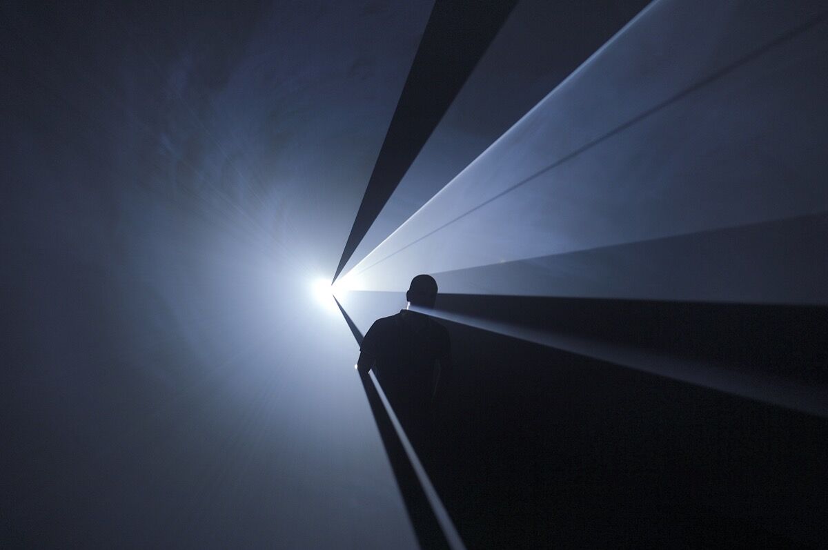 Installation view of Anthony McCall, You and I Horizontal, 2005 at Institut d’art contemporain, Villeurbanne, France, 2006. Photo by Blaise Adilon. Courtesy of Albright-Knox Art Gallery.