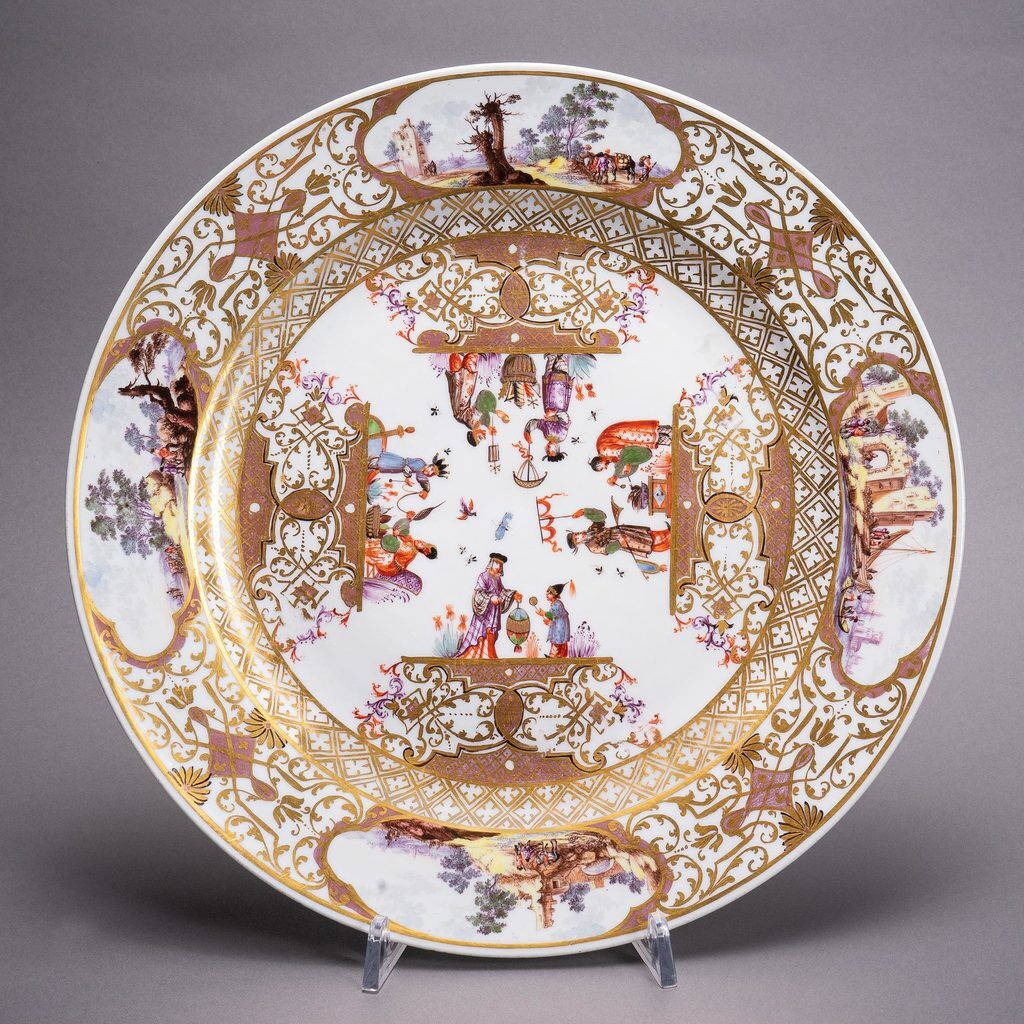 Large plate with polychrome chinoiseries and Dutch river landscapes