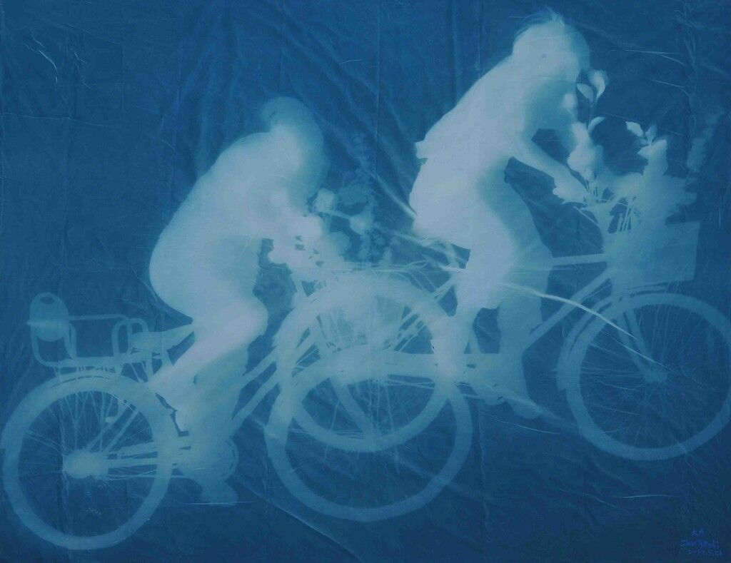 Man and Woman on Bikes