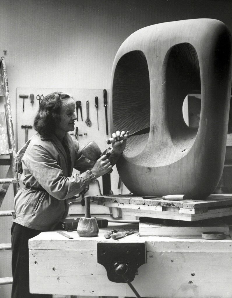 Barbara Hepworth in the Palais studio at work on the wood carving Hollow Form with White Interior