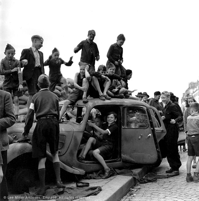 Children celebrating the liberation of Paris, France