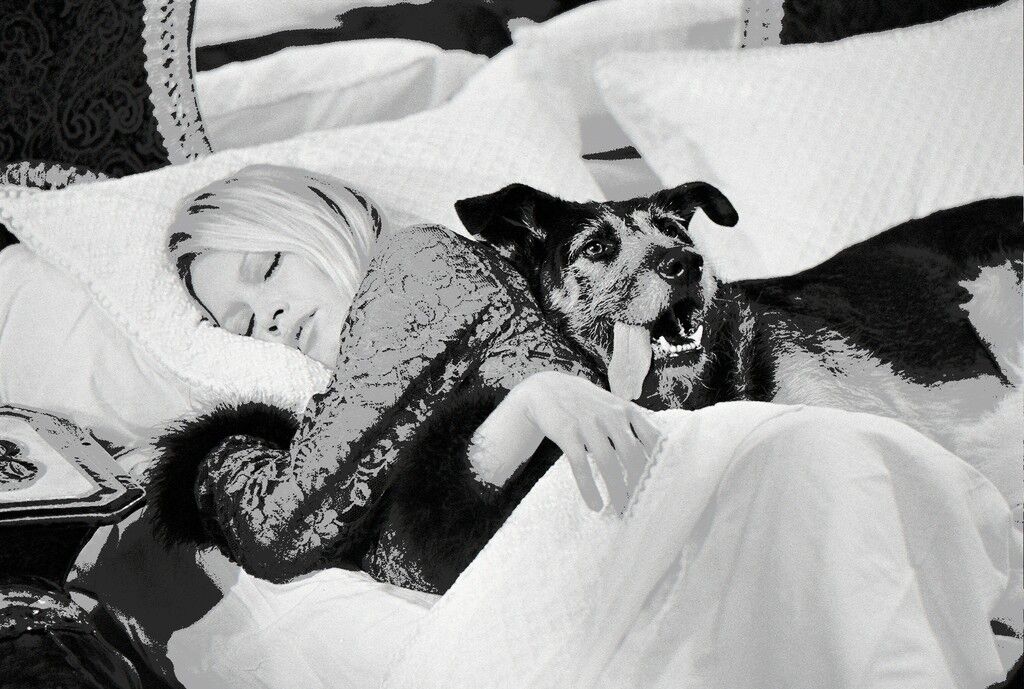 Brigitte Bardot with dog on set of 'Les Novices', 1970